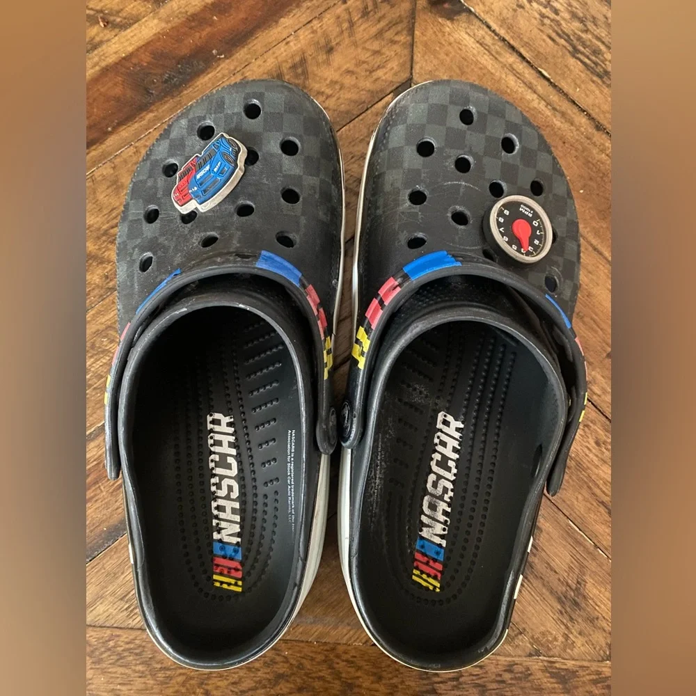 CROCS Kids Black Clogs with Blue and Red Accents